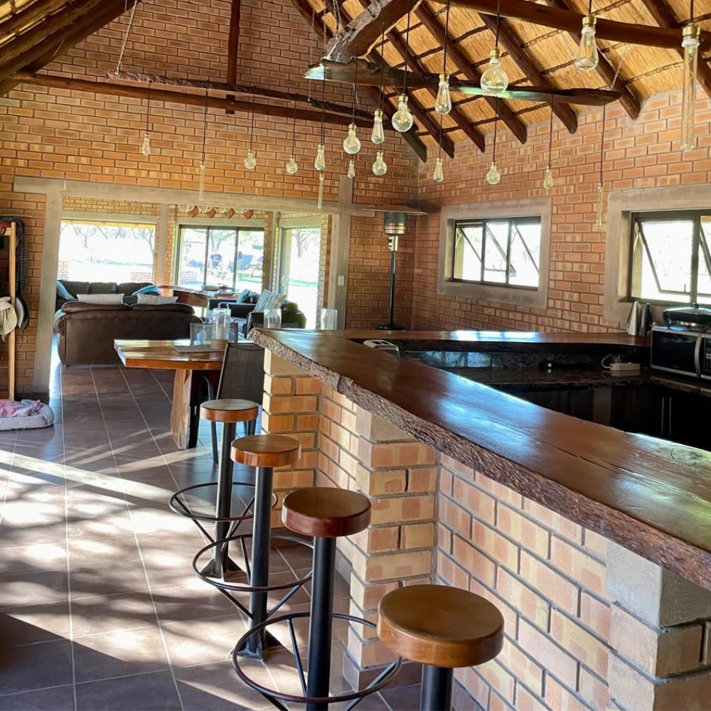 Lodge bar with brick counter and pendant lights