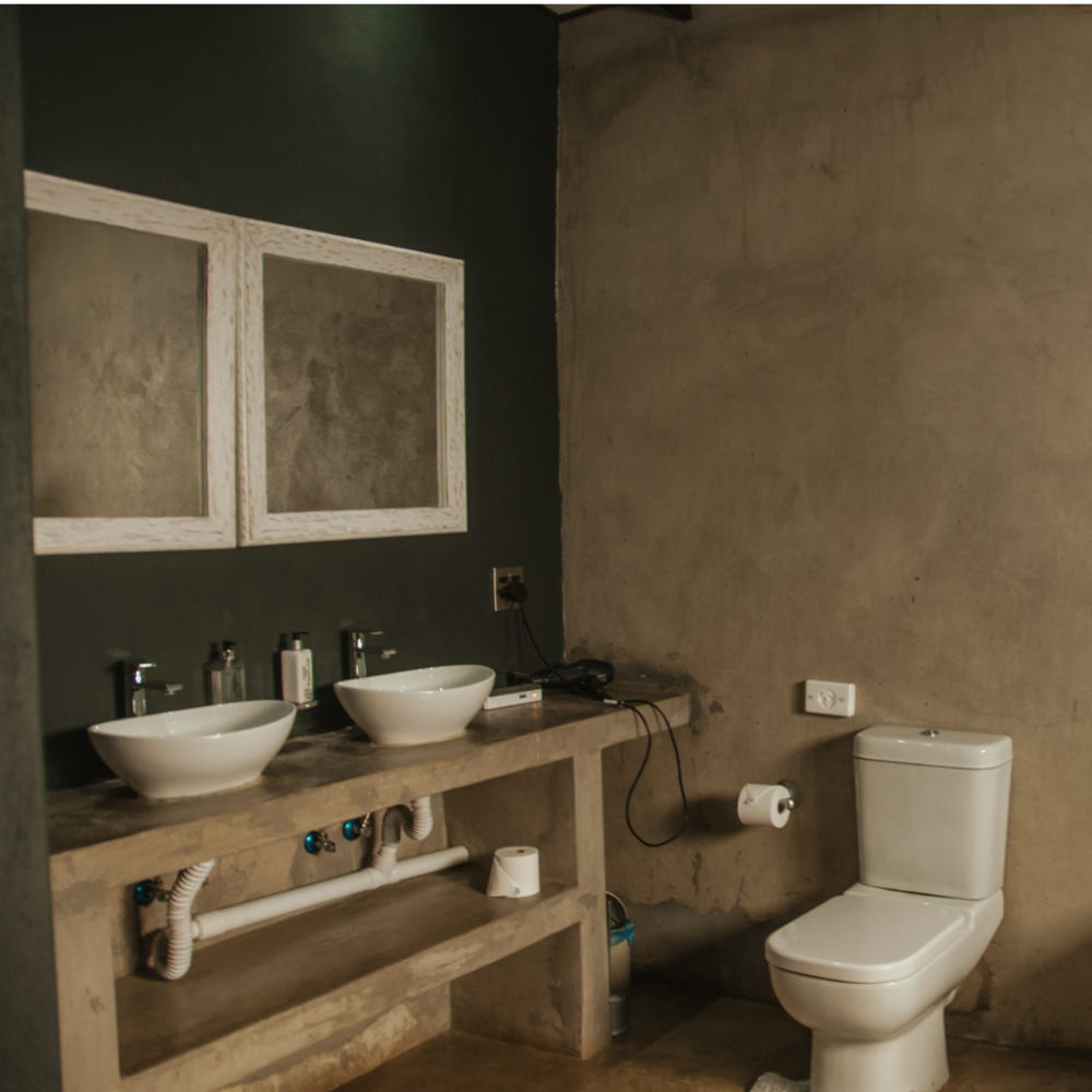 En-suite bathroom with double vessel sinks
